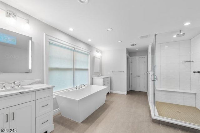 4 Hanover Rd Unit 1, Florham Park Boro, NJ 07932 - bathroom with a stall shower, two vanities, a soaking tub, and recessed lighting