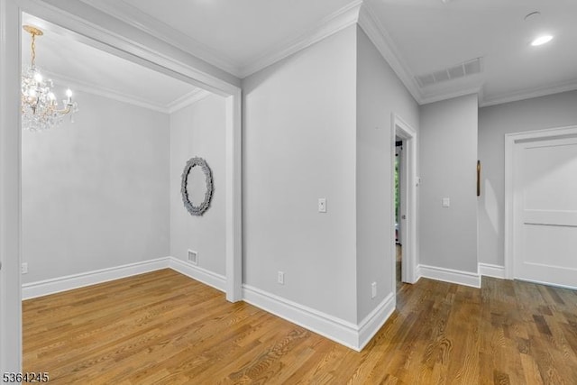 4 Hanover Rd Unit 1, Florham Park Boro, NJ 07932 - spare room with wood finished floors, a chandelier, and crown molding