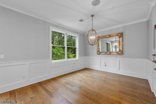 4 Hanover Rd Unit 1, Florham Park Boro, NJ 07932 - unfurnished dining area featuring crown molding, a chandelier, wood finished floors, and wainscoting
