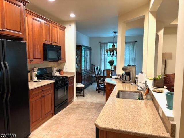 28 Ridgeview Ln, Mount Arlington Boro, NJ 07856 - kitchen featuring black appliances, brown cabinetry, recessed lighting, a peninsula, and light tile patterned flooring