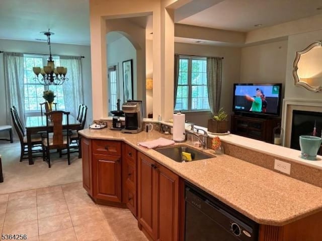 28 Ridgeview Ln, Mount Arlington Boro, NJ 07856 - kitchen with black dishwasher, light colored carpet, plenty of natural light, and brown cabinets
