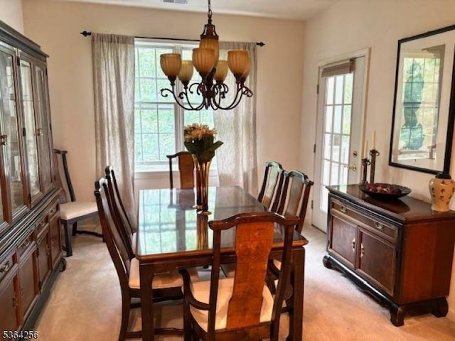 28 Ridgeview Ln, Mount Arlington Boro, NJ 07856 - dining room featuring a chandelier and light carpet