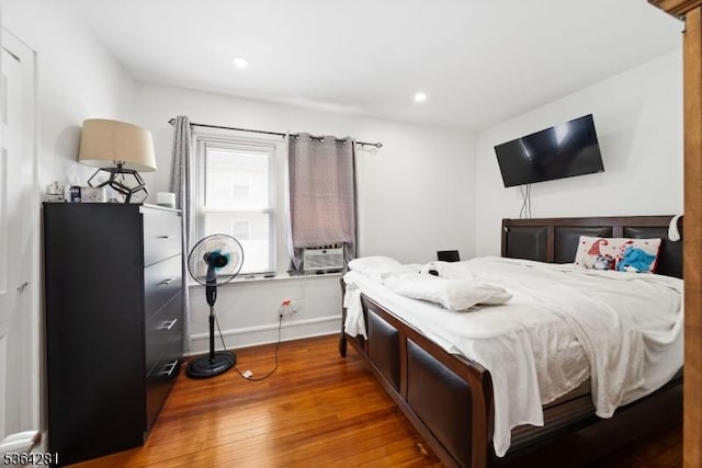 684 Harrison St, Rahway City, NJ 07065 - bedroom with wood-type flooring, recessed lighting, and cooling unit
