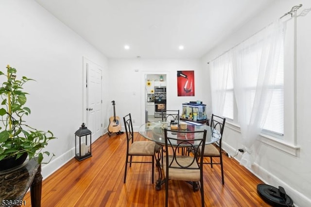684 Harrison St, Rahway City, NJ 07065 - dining area featuring hardwood / wood-style floors and recessed lighting