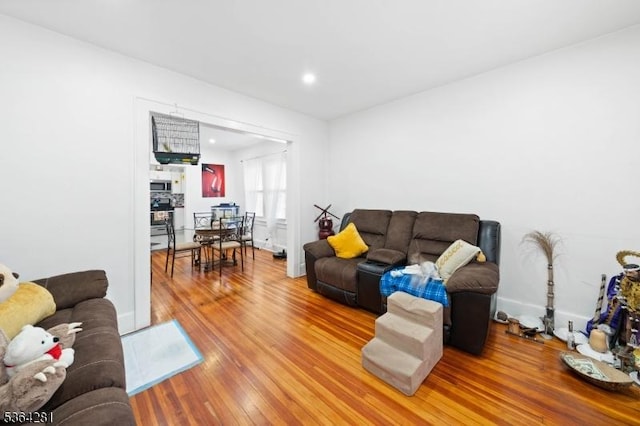 684 Harrison St, Rahway City, NJ 07065 - living room with wood finished floors and recessed lighting