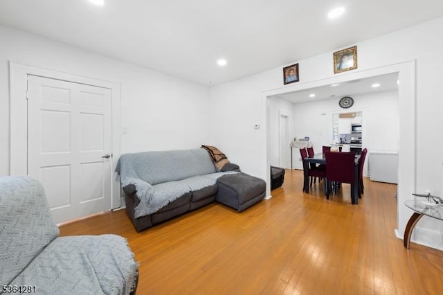 684 Harrison St, Rahway City, NJ 07065 - living room with light wood-type flooring and recessed lighting