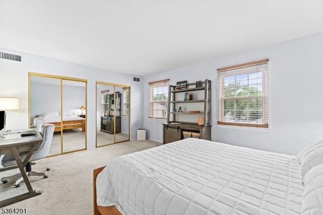 1200 Springfield Ave Unit 3A, New Providence Boro, NJ 07974 - carpeted bedroom with two closets and a desk