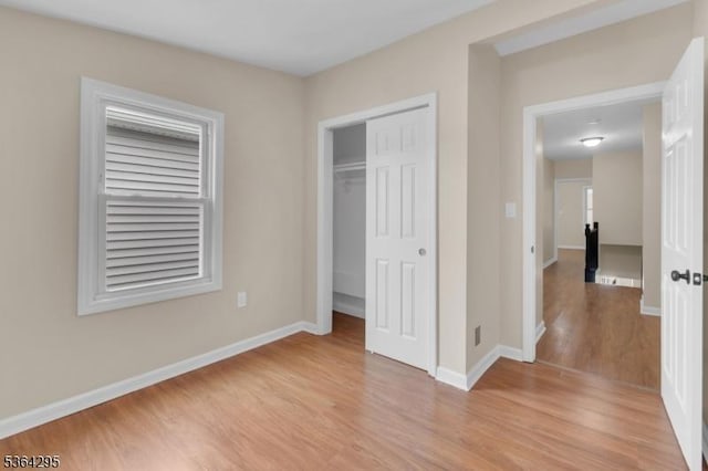 158 Catherine St Unit A/B, Elizabeth City, NJ 07201 - unfurnished bedroom featuring light wood-type flooring and a closet