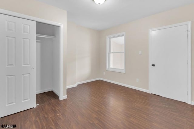 158 Catherine St Unit A/B, Elizabeth City, NJ 07201 - unfurnished bedroom with wood finished floors and a closet