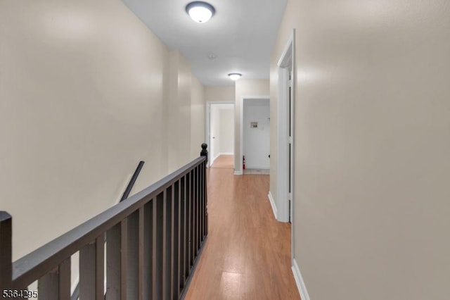 158 Catherine St Unit A/B, Elizabeth City, NJ 07201 - hall featuring light wood-style flooring and an upstairs landing