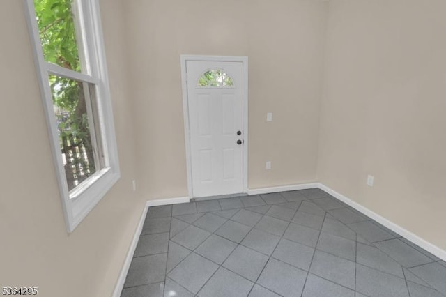158 Catherine St Unit A/B, Elizabeth City, NJ 07201 - entryway featuring baseboards and dark tile patterned flooring