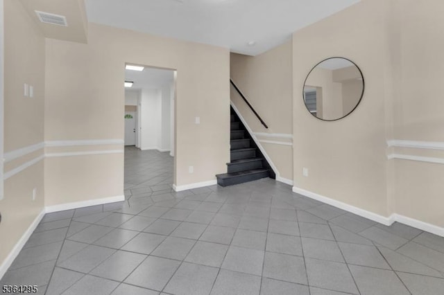 158 Catherine St Unit A/B, Elizabeth City, NJ 07201 - spare room with stairway and tile patterned flooring