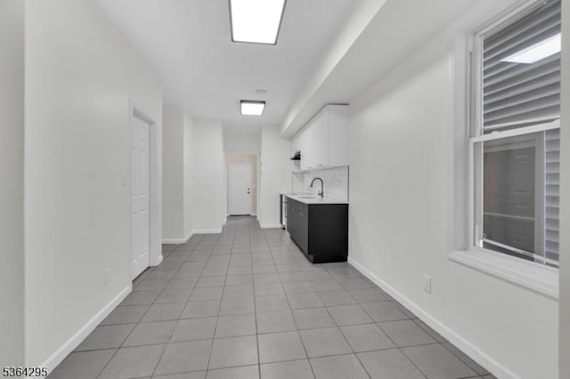 158 Catherine St Unit A/B, Elizabeth City, NJ 07201 - hallway with a sink and light tile patterned flooring