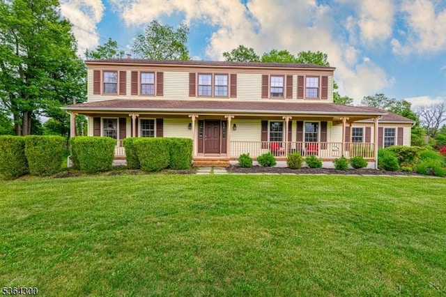 1 Warwick Dr, Washington Twp, NJ 07853 - colonial house featuring a porch and a front yard