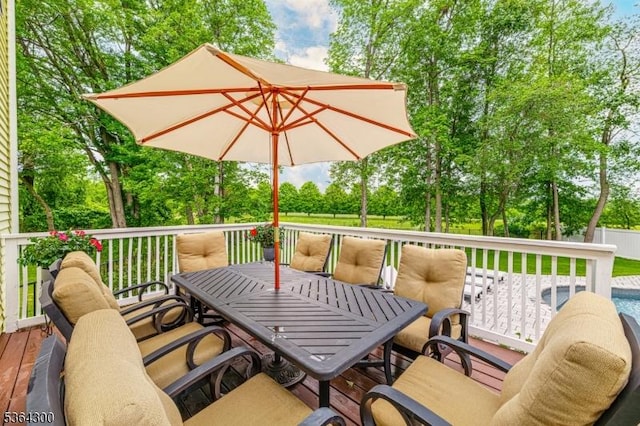 1 Warwick Dr, Washington Twp, NJ 07853 - wooden terrace featuring outdoor dining space and view of scattered trees