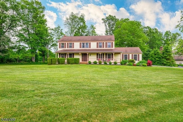 1 Warwick Dr, Washington Twp, NJ 07853 - colonial home with a porch and a front lawn