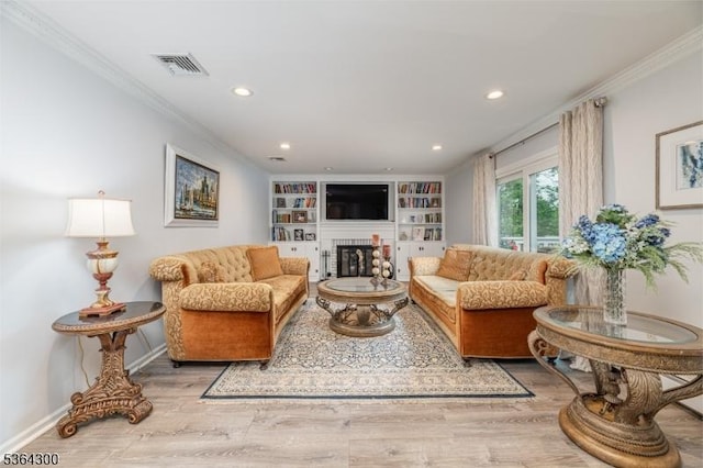 1 Warwick Dr, Washington Twp, NJ 07853 - living area with ornamental molding, recessed lighting, a fireplace, wood finished floors, and built in features