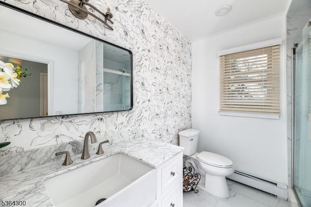 1 Warwick Dr, Washington Twp, NJ 07853 - bathroom featuring a baseboard radiator, marble look tiles, vanity, and a shower with door