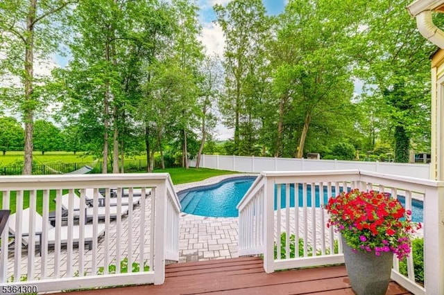1 Warwick Dr, Washington Twp, NJ 07853 - view of swimming pool with a fenced backyard, view of wooded area, and a wooden deck