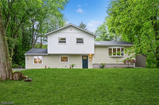 9 Somerset Pl, West Milford Twp, NJ 07480 - rear view of property featuring a lawn and roof with shingles