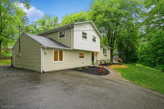 9 Somerset Pl, West Milford Twp, NJ 07480 - view of front of house with a shingled roof and a front yard