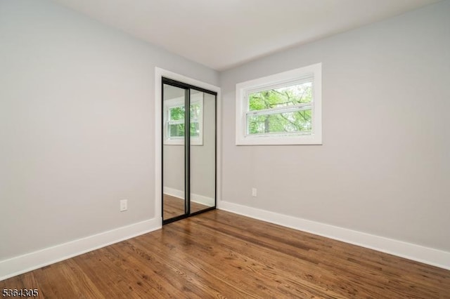 9 Somerset Pl, West Milford Twp, NJ 07480 - unfurnished bedroom with wood finished floors and a closet