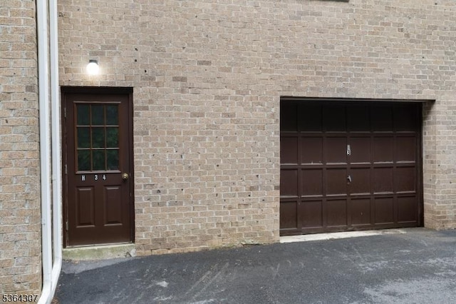 322 Richard Mine Rd Unit H3, Rockaway Twp, NJ 07885 - entrance to property featuring brick siding and a garage