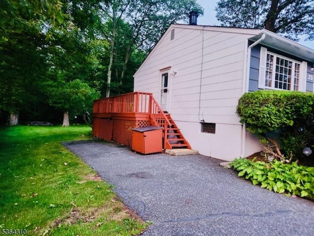 23 Felter Pl, Jefferson Twp, NJ 07849 - view of property exterior with a deck, a yard, and stairway