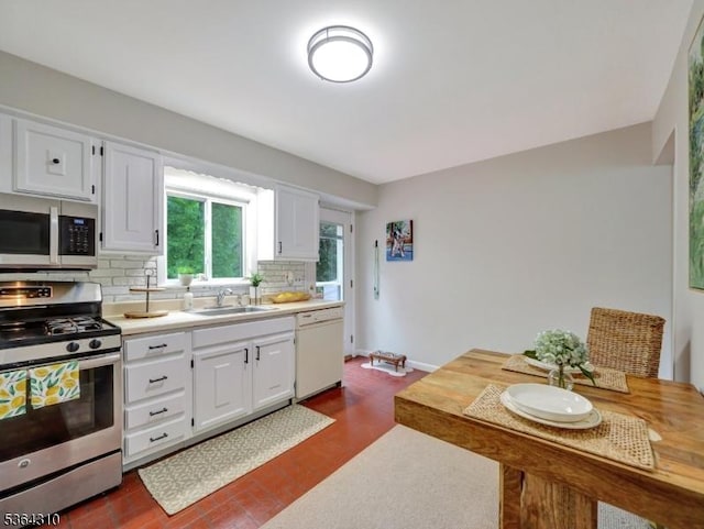 23 Felter Pl, Jefferson Twp, NJ 07849 - kitchen featuring appliances with stainless steel finishes, tasteful backsplash, white cabinets, and light countertops