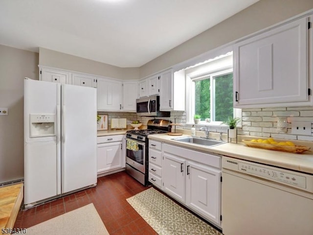 23 Felter Pl, Jefferson Twp, NJ 07849 - kitchen featuring appliances with stainless steel finishes, white cabinets, tasteful backsplash, and light countertops