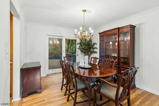 2242 Shawnee Path, Scotch Plains Twp, NJ 07076 - dining room with a chandelier, light wood finished floors, and ornamental molding