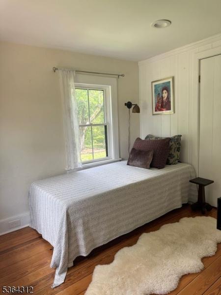 4 Lambert Rd, Delaware Twp, NJ 08559 - bedroom featuring baseboards and wood finished floors