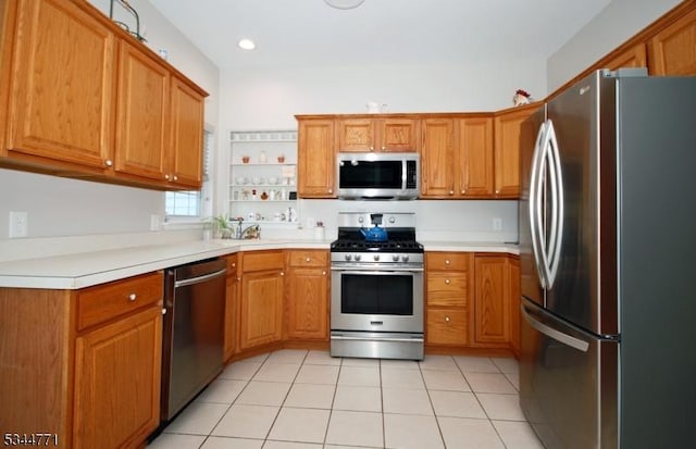 58 Greenbrook Rd, Green Brook Twp, NJ 08812 - kitchen with stainless steel appliances, brown cabinets, and light countertops