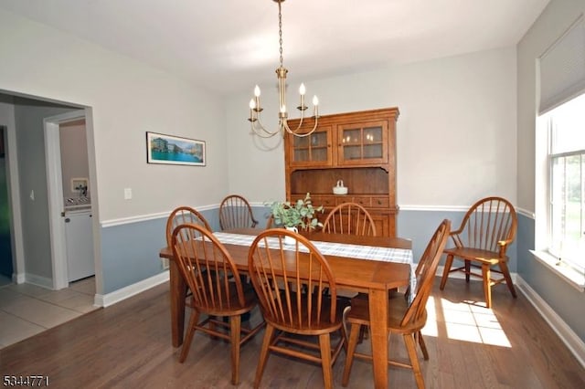 58 Greenbrook Rd, Green Brook Twp, NJ 08812 - dining space with a chandelier and wood finished floors