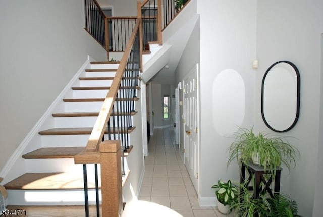 58 Greenbrook Rd, Green Brook Twp, NJ 08812 - staircase with tile patterned flooring and a high ceiling