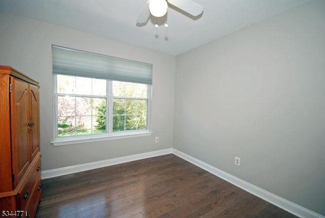 58 Greenbrook Rd, Green Brook Twp, NJ 08812 - spare room featuring dark wood-type flooring and ceiling fan