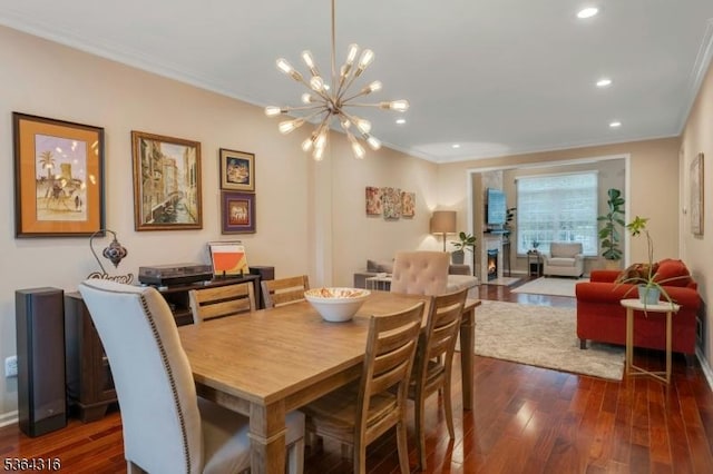 7 Whalen Ct, West Orange Twp, NJ 07052 - dining room featuring dark wood-style flooring, crown molding, a chandelier, and recessed lighting