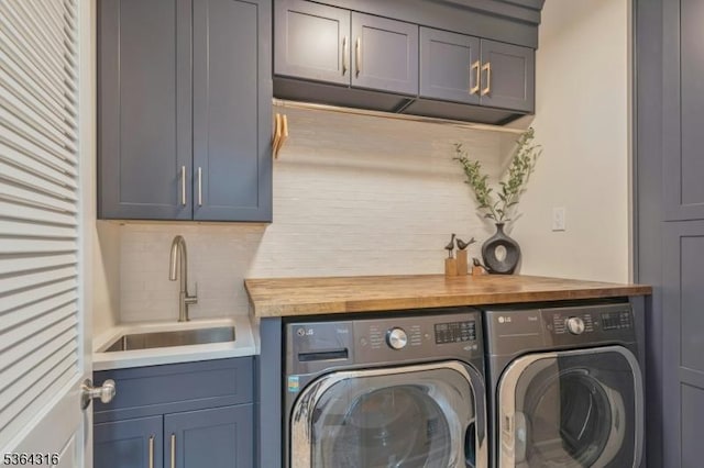 7 Whalen Ct, West Orange Twp, NJ 07052 - laundry area featuring washing machine and clothes dryer and cabinet space