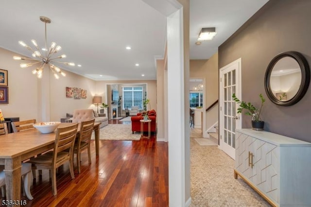7 Whalen Ct, West Orange Twp, NJ 07052 - dining area with a chandelier, hardwood / wood-style floors, and crown molding