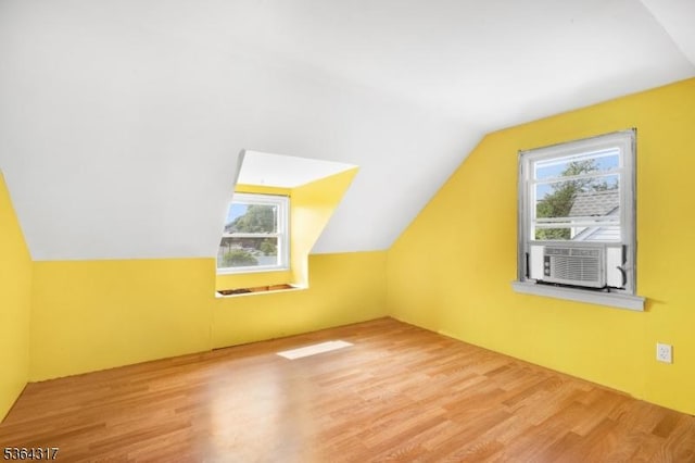 520 Marion St, Bound Brook Boro, NJ 08805 - bonus room featuring cooling unit, lofted ceiling, and wood finished floors