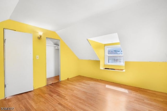 520 Marion St, Bound Brook Boro, NJ 08805 - additional living space featuring vaulted ceiling and wood finished floors