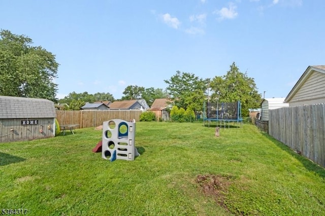 520 Marion St, Bound Brook Boro, NJ 08805 - fenced backyard with a trampoline and a storage shed