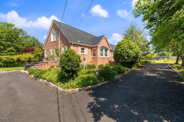 87 S Ridgedale Ave, East Hanover Twp, NJ 07936 - view of side of property featuring brick siding and stairs