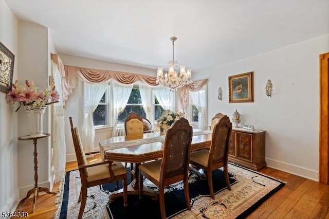 87 S Ridgedale Ave, East Hanover Twp, NJ 07936 - dining room featuring a chandelier and light wood-style floors
