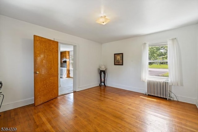 87 S Ridgedale Ave, East Hanover Twp, NJ 07936 - empty room with radiator heating unit and wood finished floors
