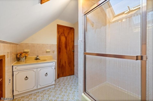 87 S Ridgedale Ave, East Hanover Twp, NJ 07936 - bathroom with tile walls, lofted ceiling, vanity, and a stall shower