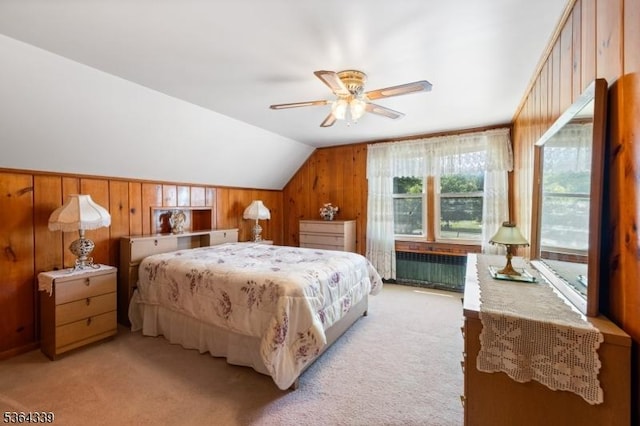 87 S Ridgedale Ave, East Hanover Twp, NJ 07936 - bedroom with lofted ceiling, light colored carpet, radiator, wooden walls, and a ceiling fan