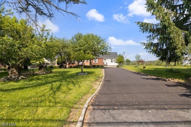 87 S Ridgedale Ave, East Hanover Twp, NJ 07936 - view of front of house with a front yard and asphalt driveway
