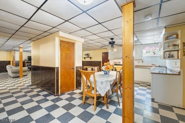 87 S Ridgedale Ave, East Hanover Twp, NJ 07936 - dining area with light floors, a drop ceiling, and a wainscoted wall