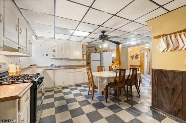 87 S Ridgedale Ave, East Hanover Twp, NJ 07936 - dining area with dark floors, a ceiling fan, and a paneled ceiling